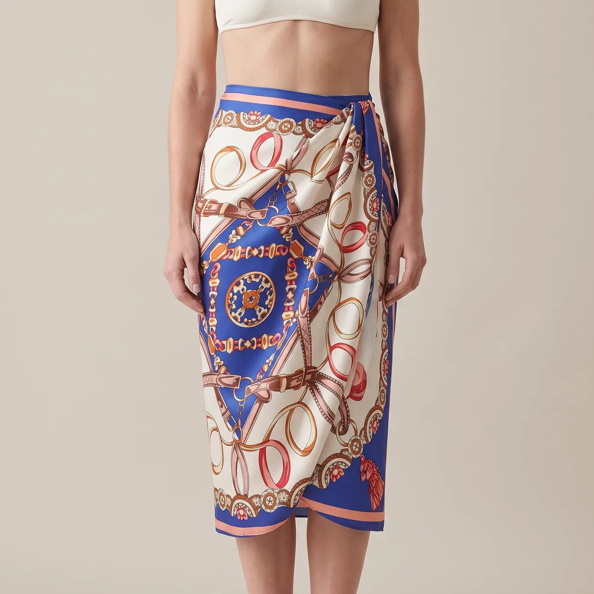 Royal blue print silk shawl twisted into a knot at one hip as a sarong, the blue star across the front