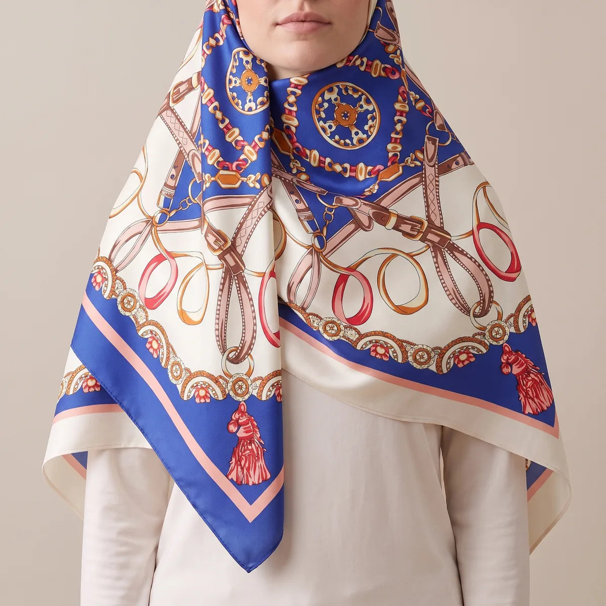 Blue and cream silk shawl worn over the hair and around the neck as a hooded wrap