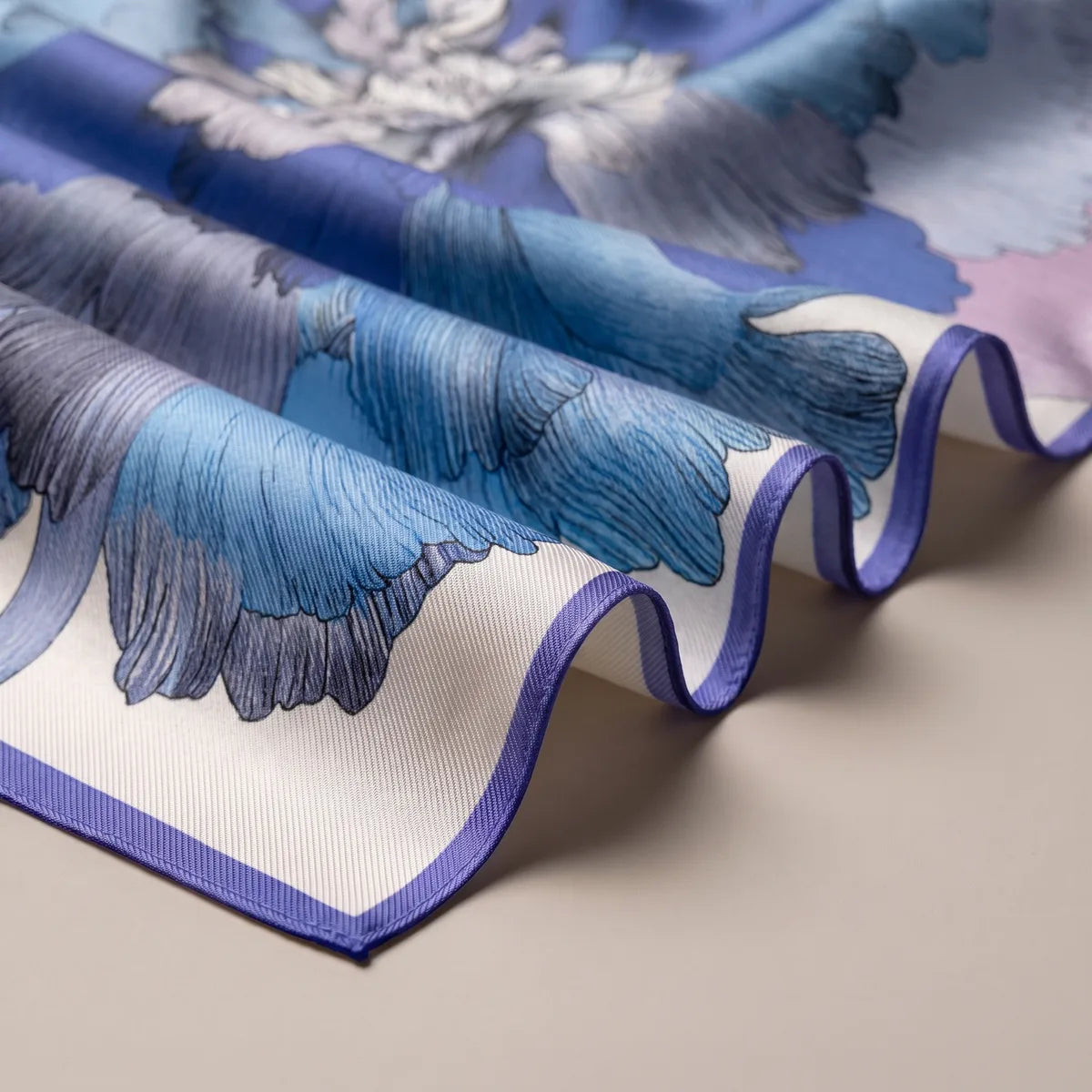 Wavy periwinkle hem along folds of blue peony petals traced in darker lines