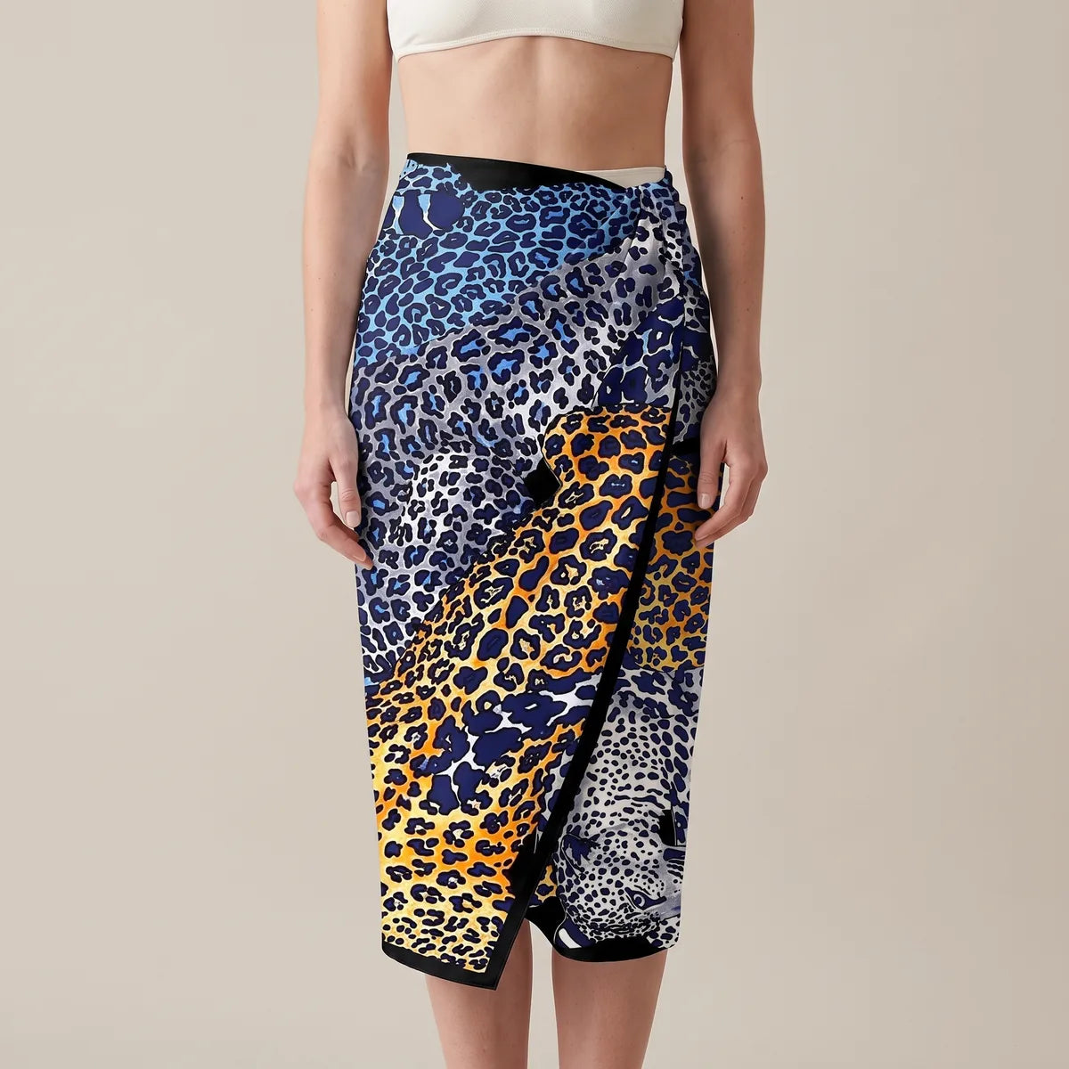 Blue and orange leopard silk shawl tied at the waist as a sarong skirt, navy edge along the overlap