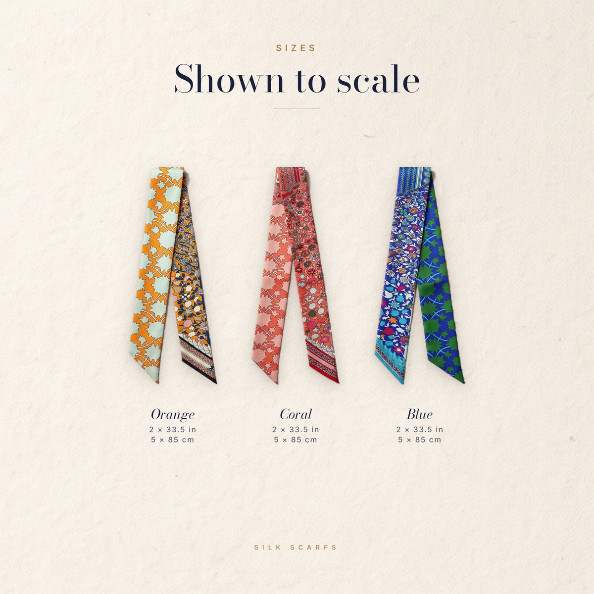 Tile Garden skinny scarves in orange, coral and blue lined up to scale with their measurements