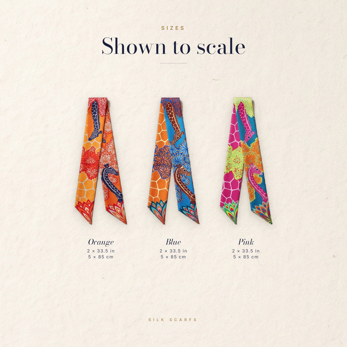 The three giraffe print skinny scarves shown to scale with their length and width