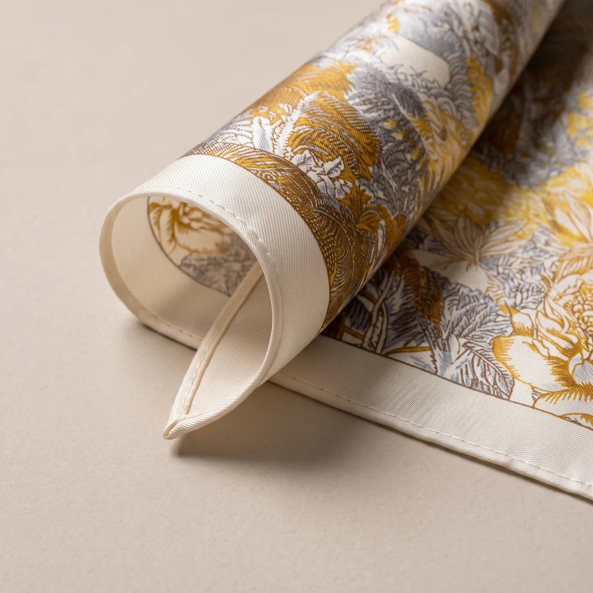 Corner of the gray and mustard square turned up: large drawn blooms, cream border and a lighter reverse