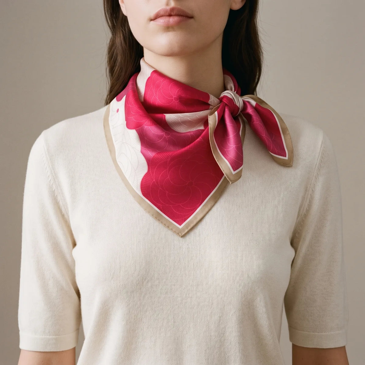 Red floral silk bandana tied as a neckerchief with the knot at the side