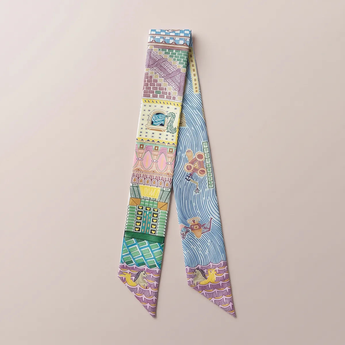 Light blue architecture skinny silk and satin scarf laid flat: lilac and green facades on one strand, sky blue waves on the other