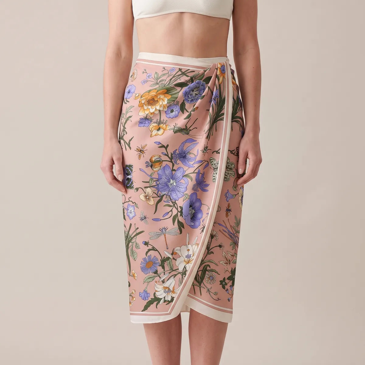 Blush floral silk shawl tied at the waist as a wrap skirt, cream edge on the overlap